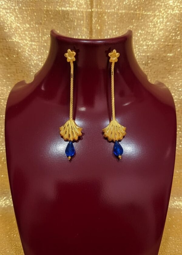 African sole statement earrings